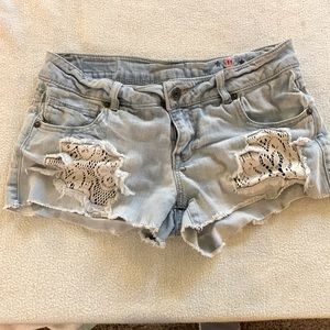 Celebrity pink distressed frayed jean shorts